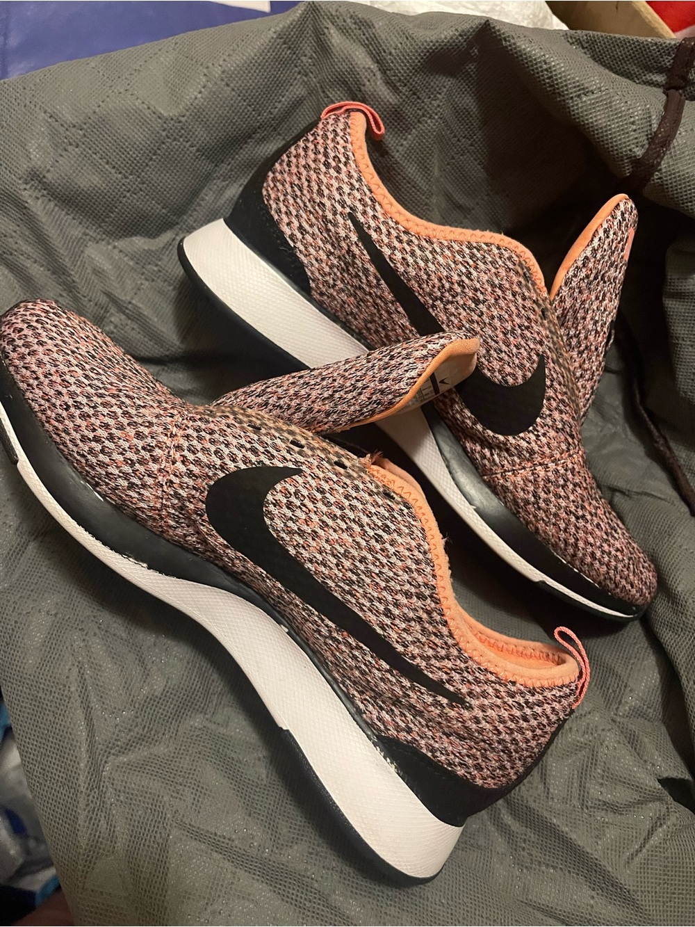 Nike Women’s Peach and Black Knit Slip-On Running Shoes